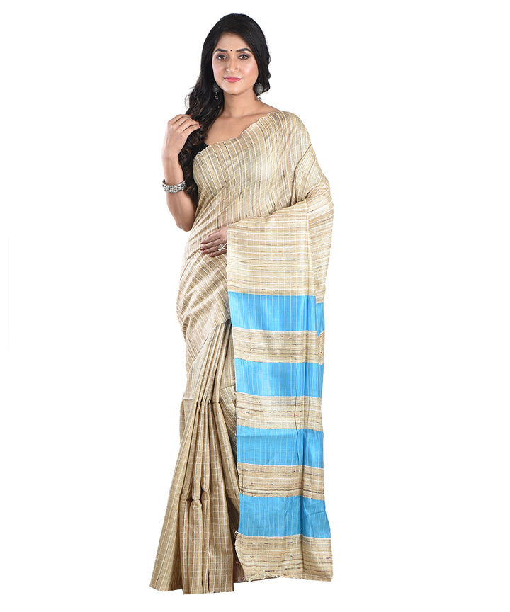 Beige sky blue handwoven tussar silk saree