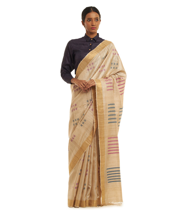 Handwoven green kosa saree with geometric motifs