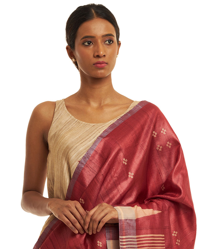 Handwoven red kosa saree with offwhite temple border