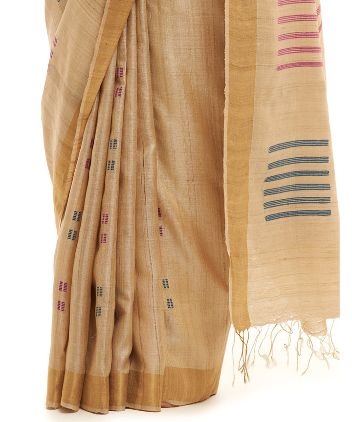Handwoven green kosa saree with geometric motifs