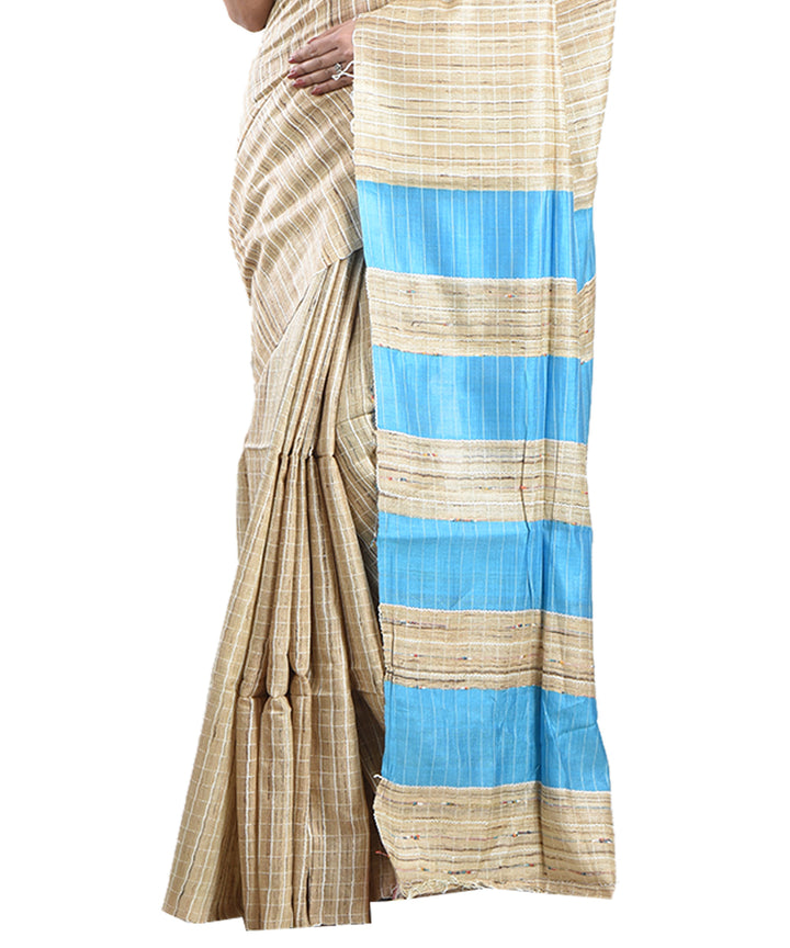 Beige sky blue handwoven tussar silk saree