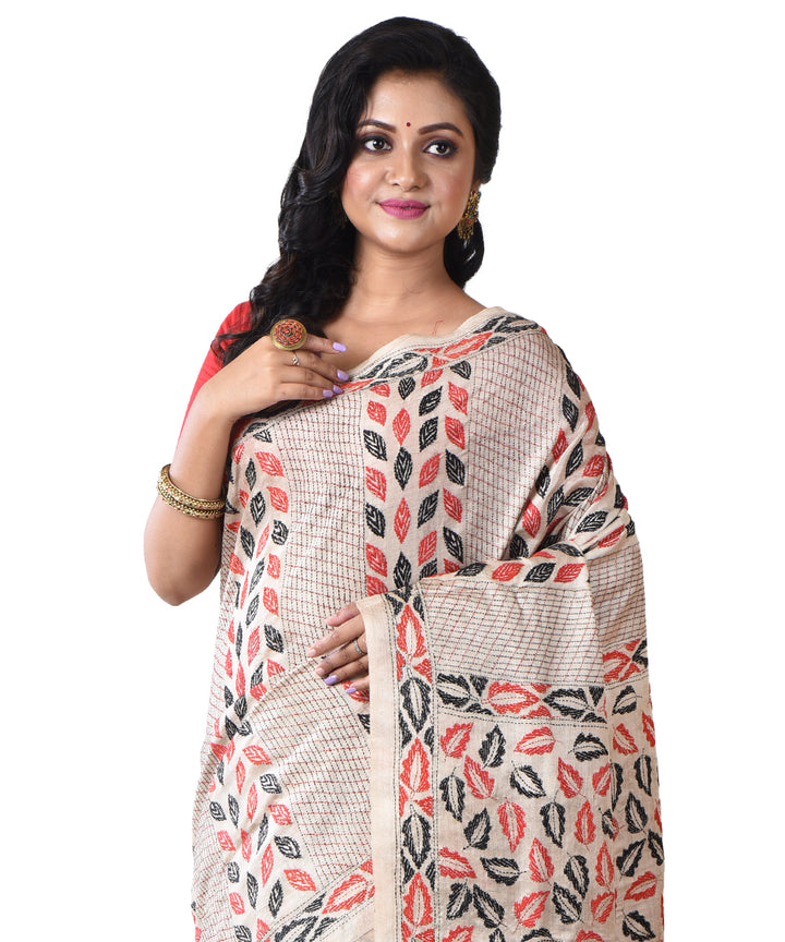 Beige floral hand kantha stitched tussar silk saree