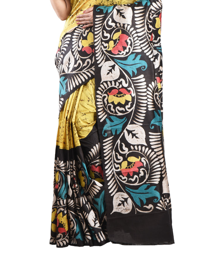Yellow multicolor handloom silk batik print saree