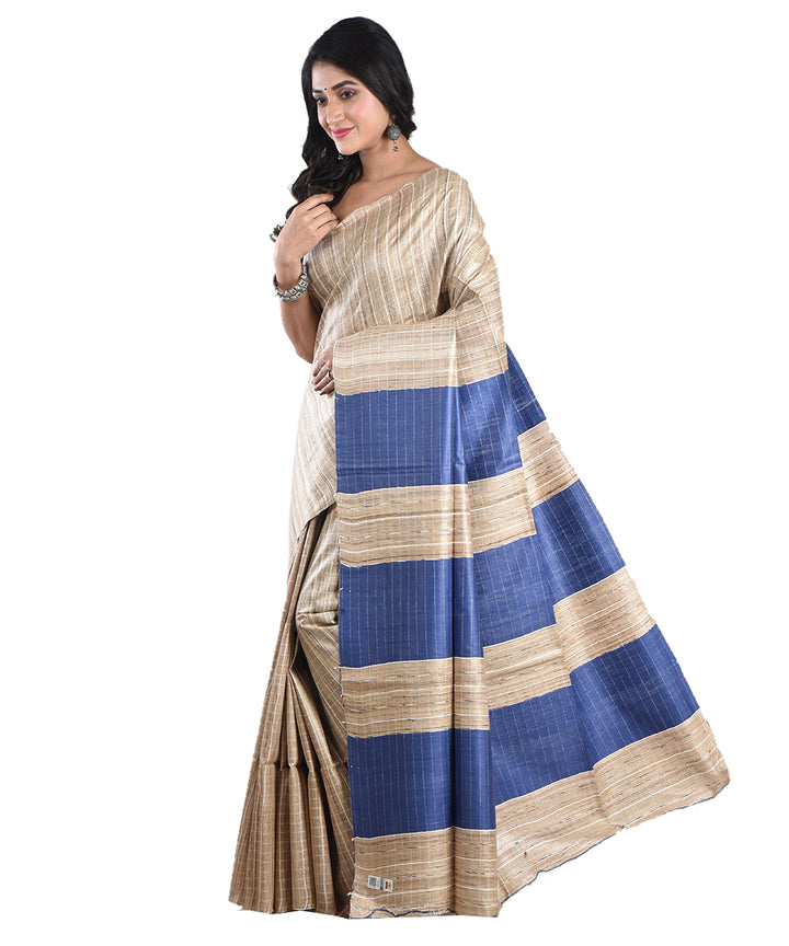 Beige navy blue handwoven tussar silk saree