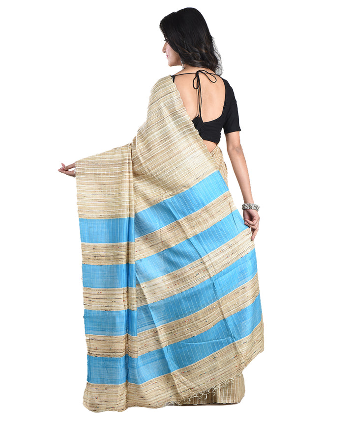 Beige sky blue handwoven tussar silk saree