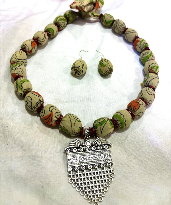Dark green handmade block print fabric and metal necklace