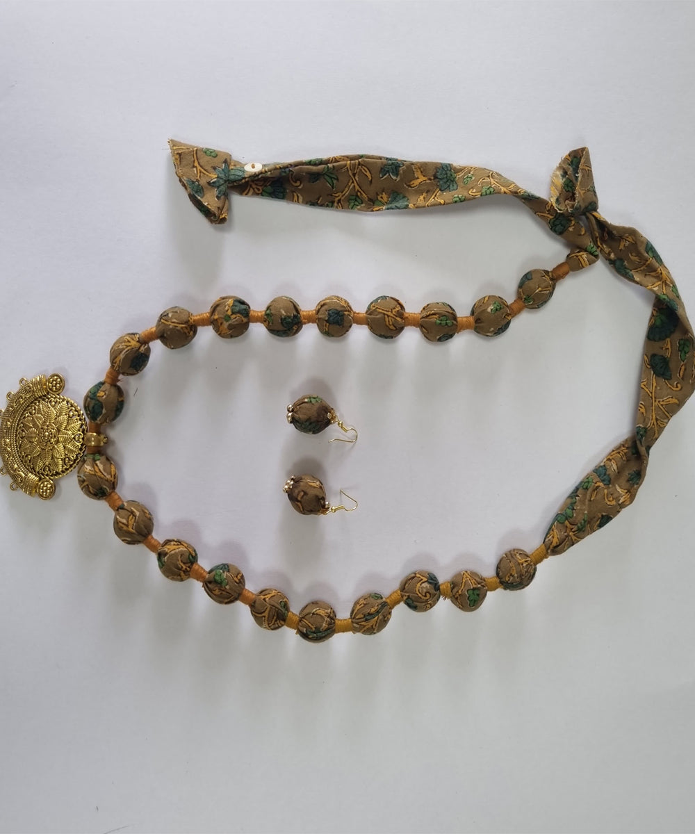 Mustard handmade block print fabric and metal necklace