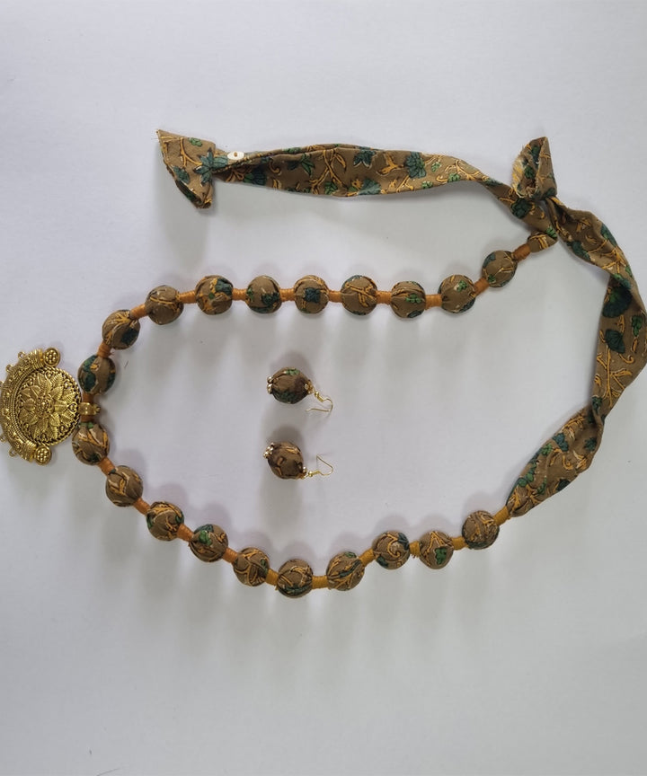 Mustard handmade block print fabric and metal necklace