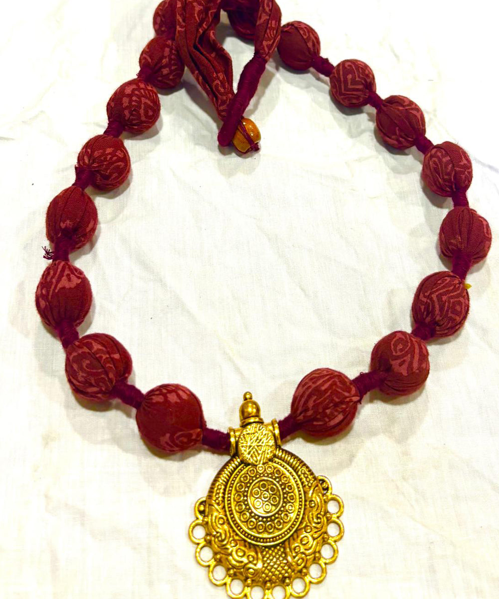 Red golden handmade block print fabric and metal necklace