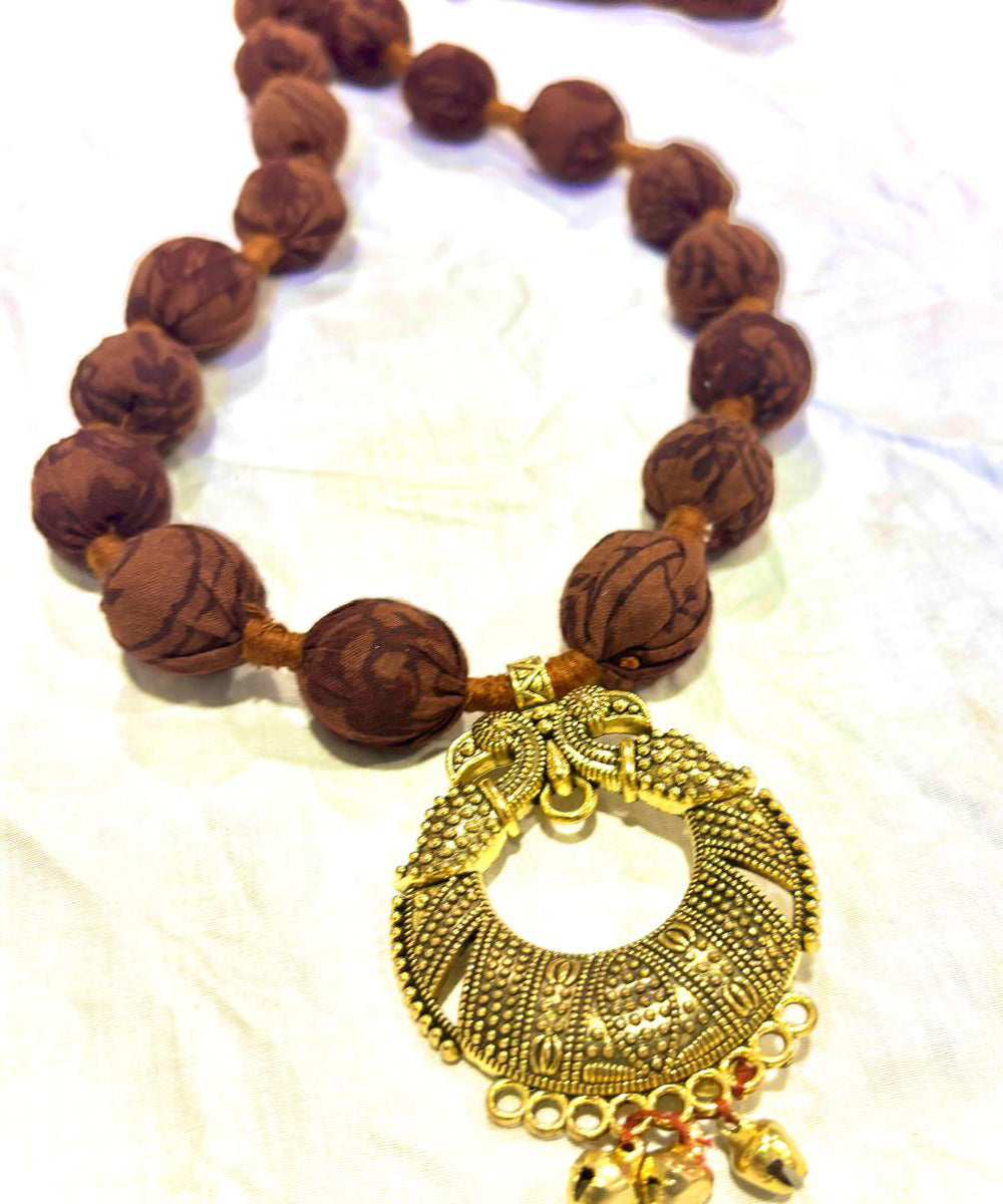 Brown handmade block print fabric and metal necklace