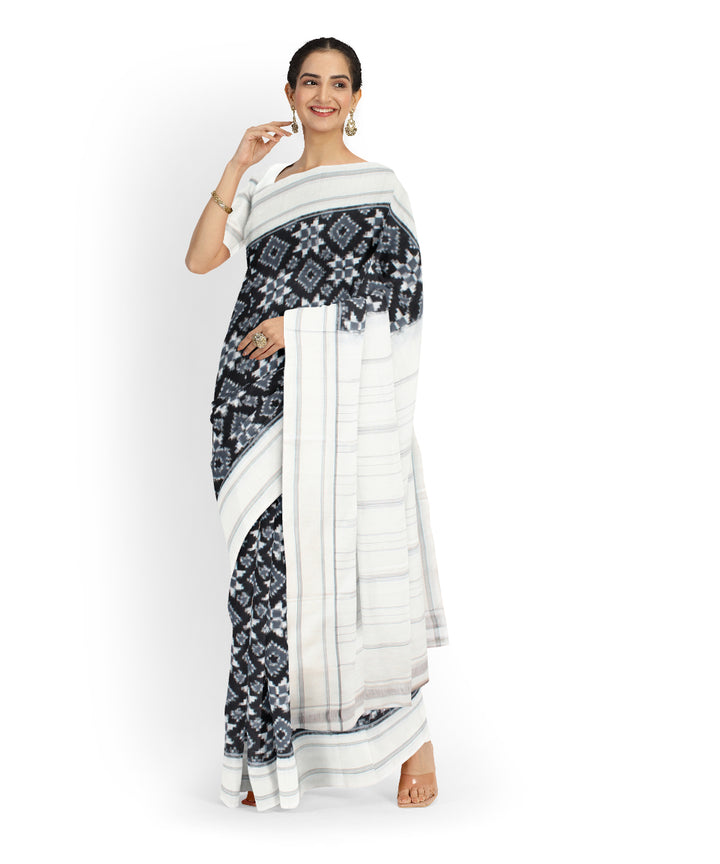 Black offwhite teliarumal cotton handwoven pochampally ikat saree