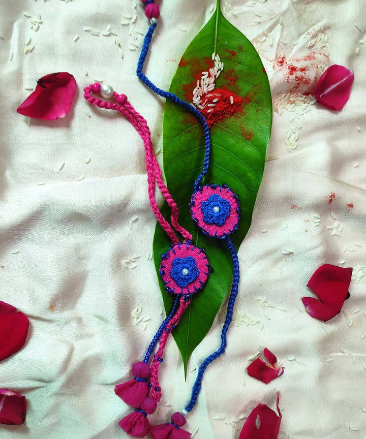 Blue pink hand crafted thread work upcycled fabric rakhi