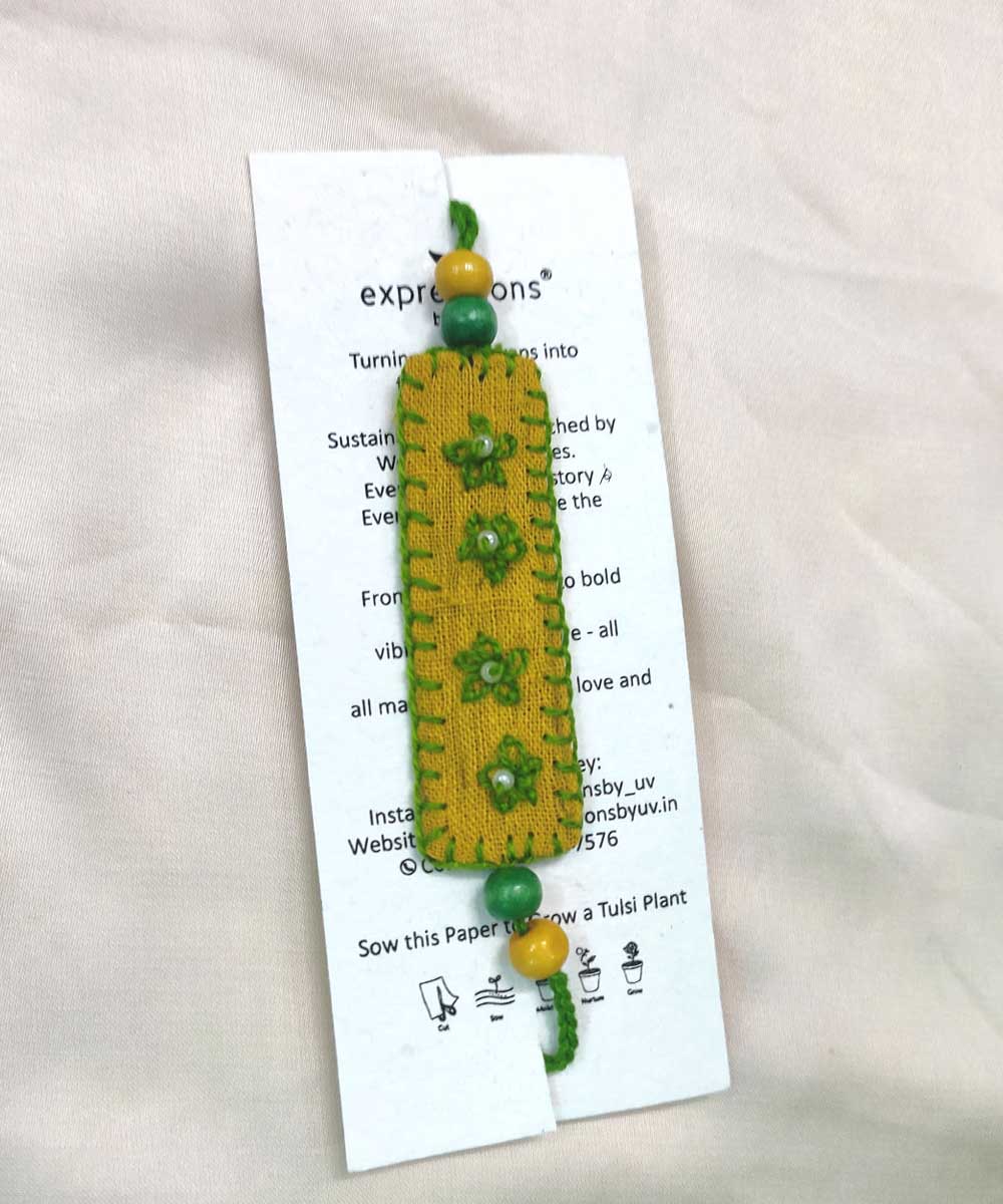 Yellow green handcrafted thread work upcycled fabric rakhi