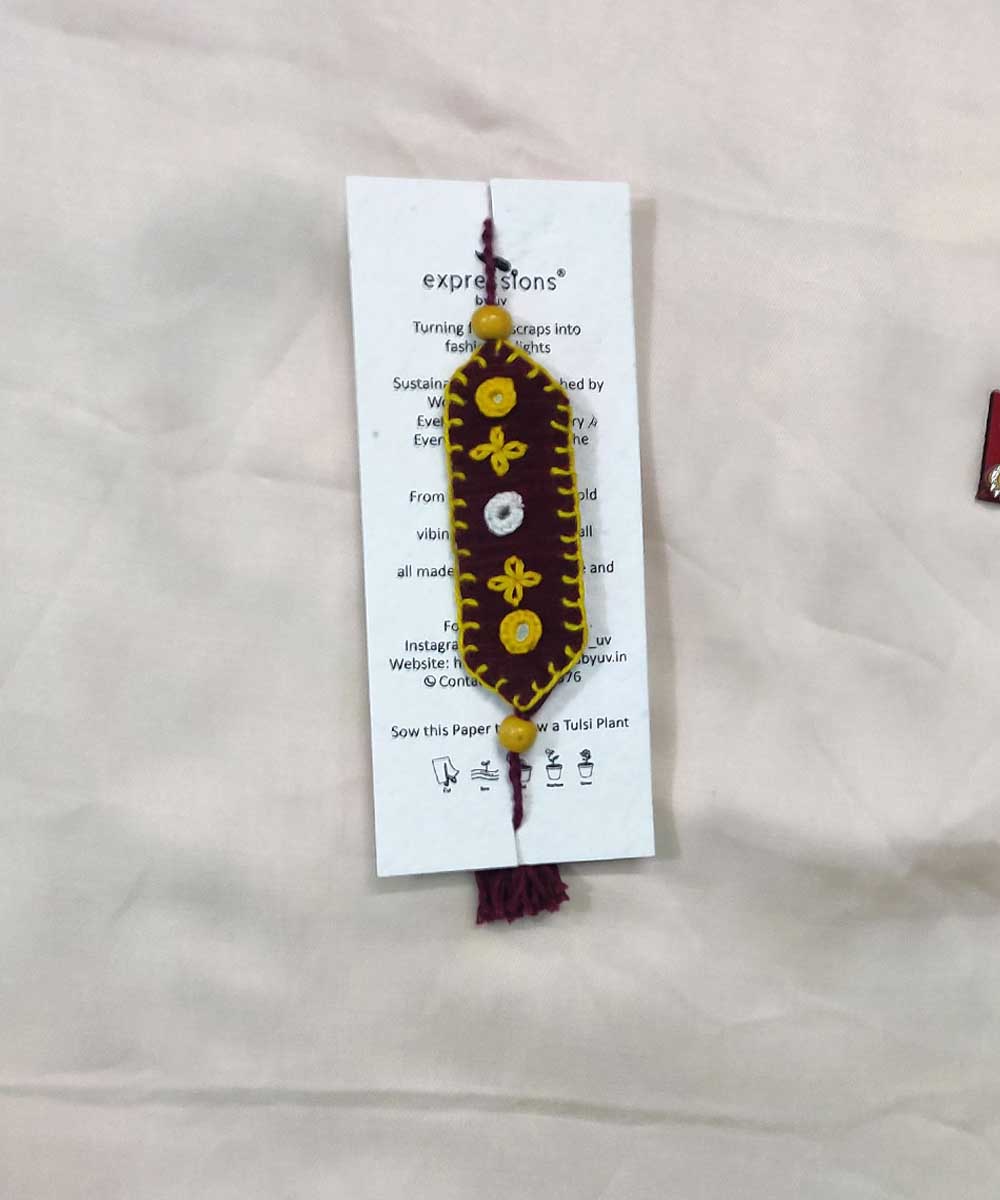 Maroon yellow handcrafted thread work upcycled fabric rakhi