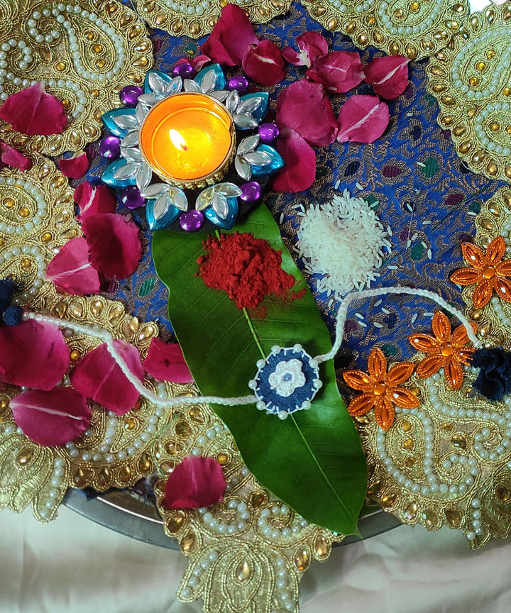 Navy blue white handmade thread work upcycled fabric rakhi