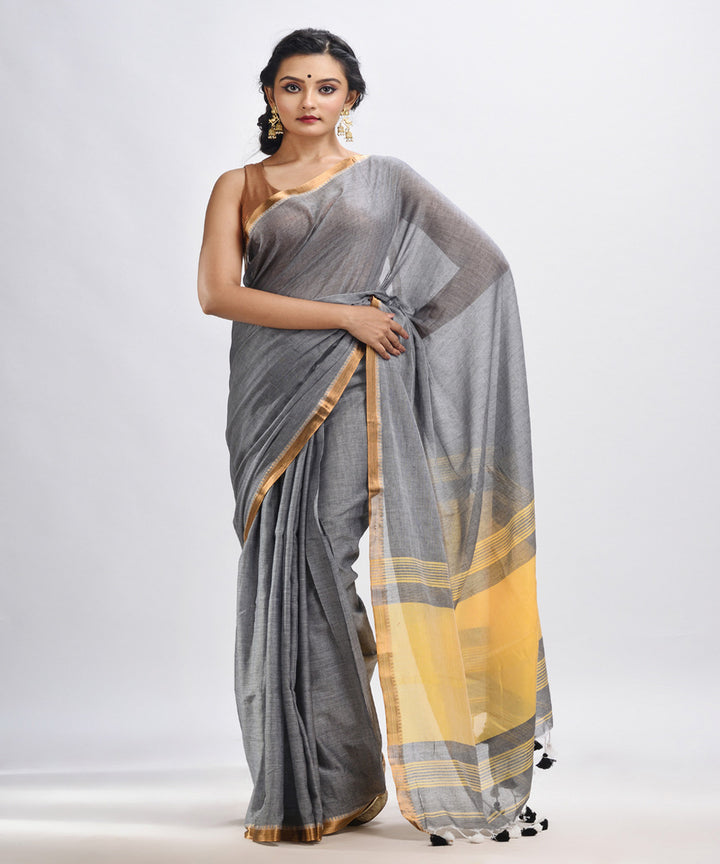 Grey yellow handloom cotton bengal saree with zari pallu border
