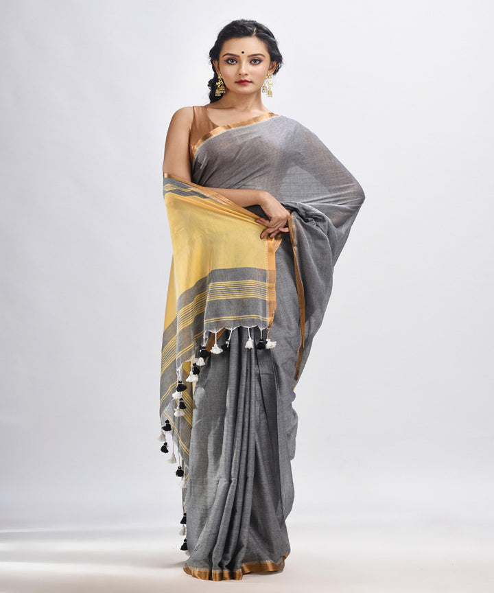 Grey yellow handloom cotton bengal saree with zari pallu border