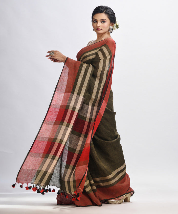 Dark green handwoven linen bengal saree