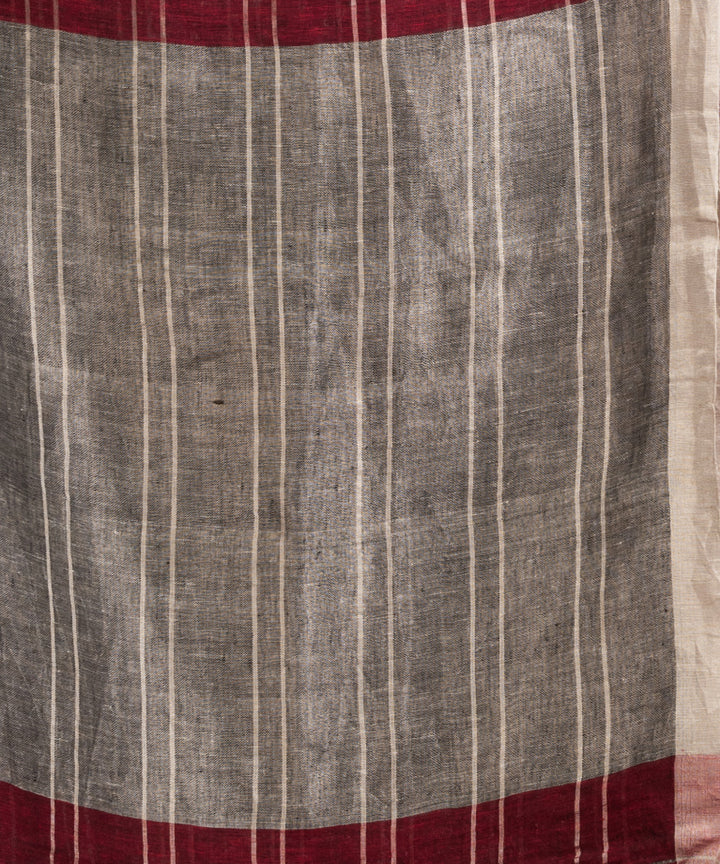 Maroon handloom linen with silver zari bengal saree