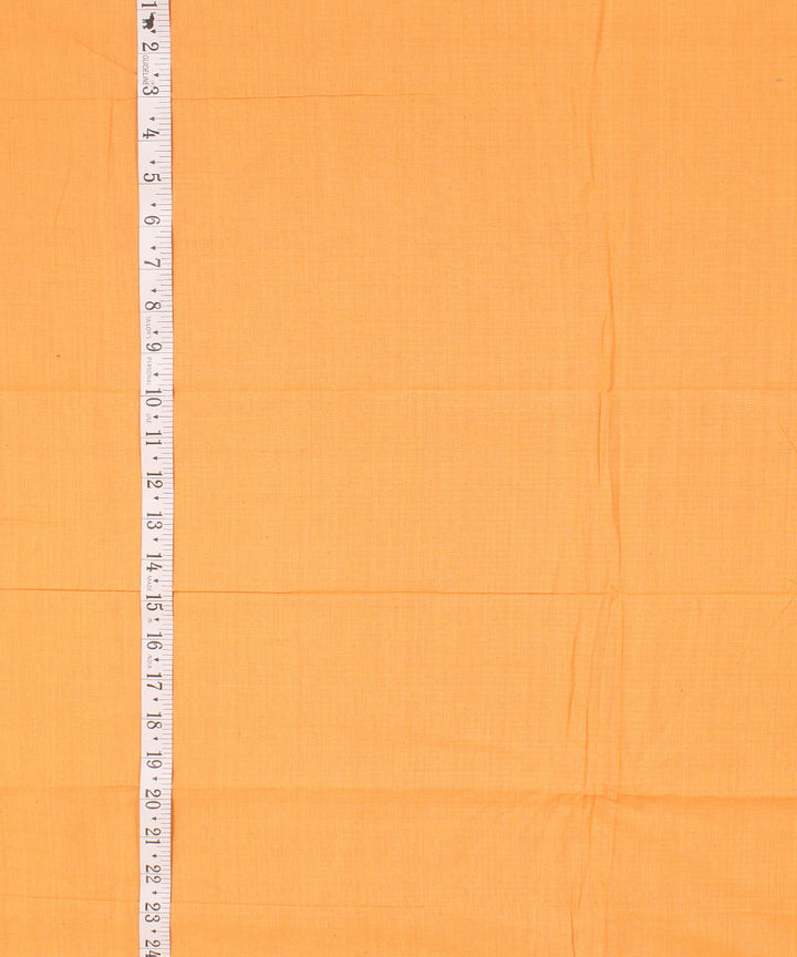 Amber yellow plain handwoven cotton fabric