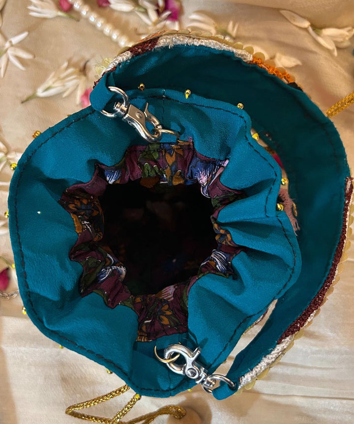 Turquoise green hand embroidered kashmiri potli bag