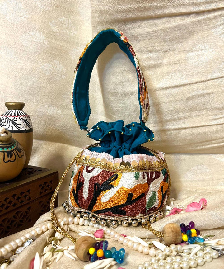 Turquoise green hand embroidered kashmiri potli bag