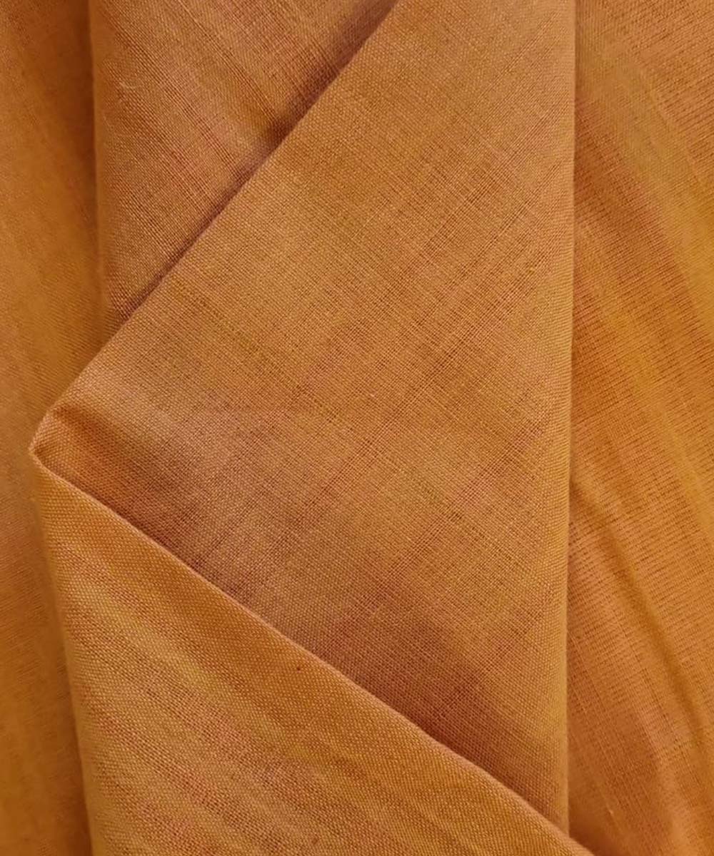 Rust handwoven cotton assam fabric