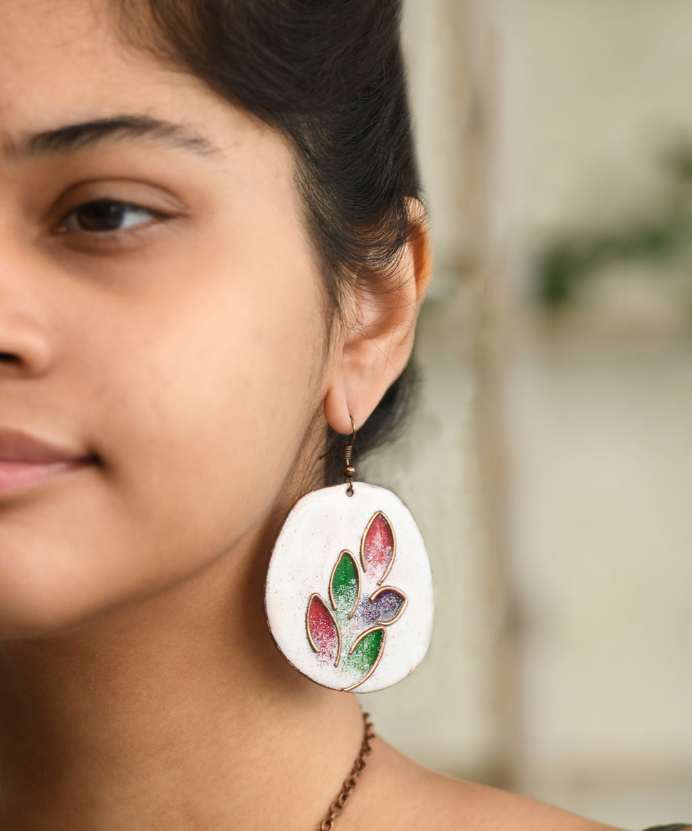 White handcrafted leaf motif copper enamel earrings