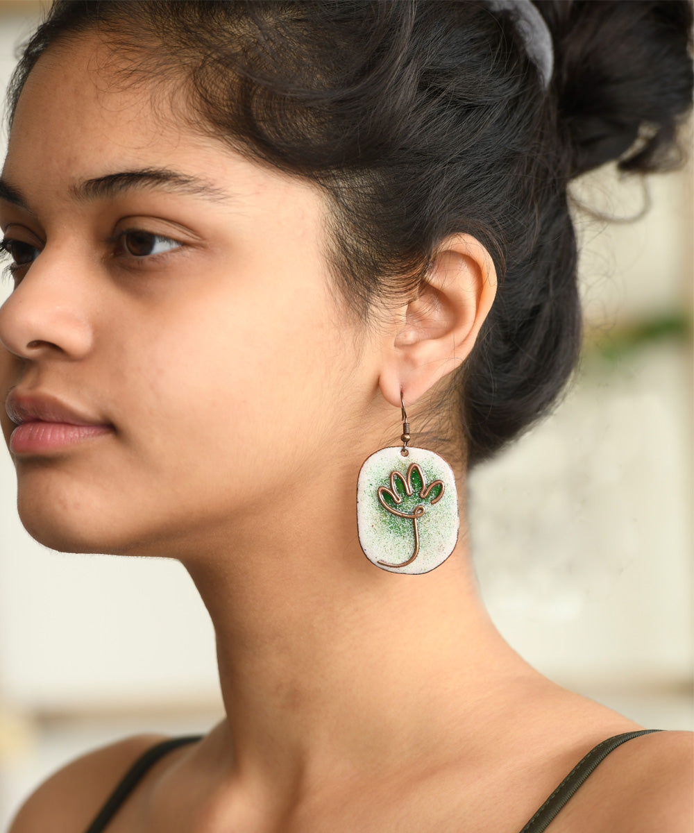 White green handcrafted flower motif copper enamel earrings