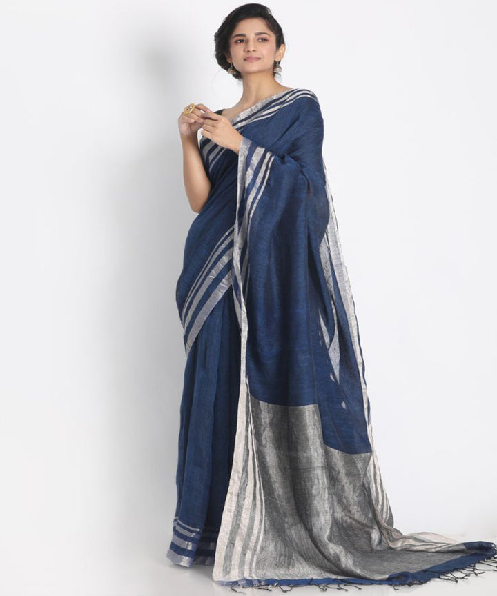 Blue linen saree with silver zori border