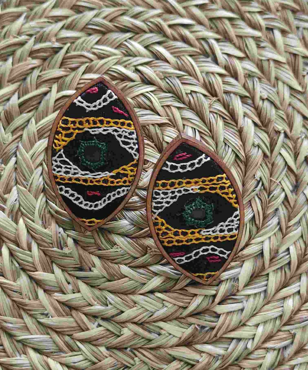 Dark green hand embroidered studs