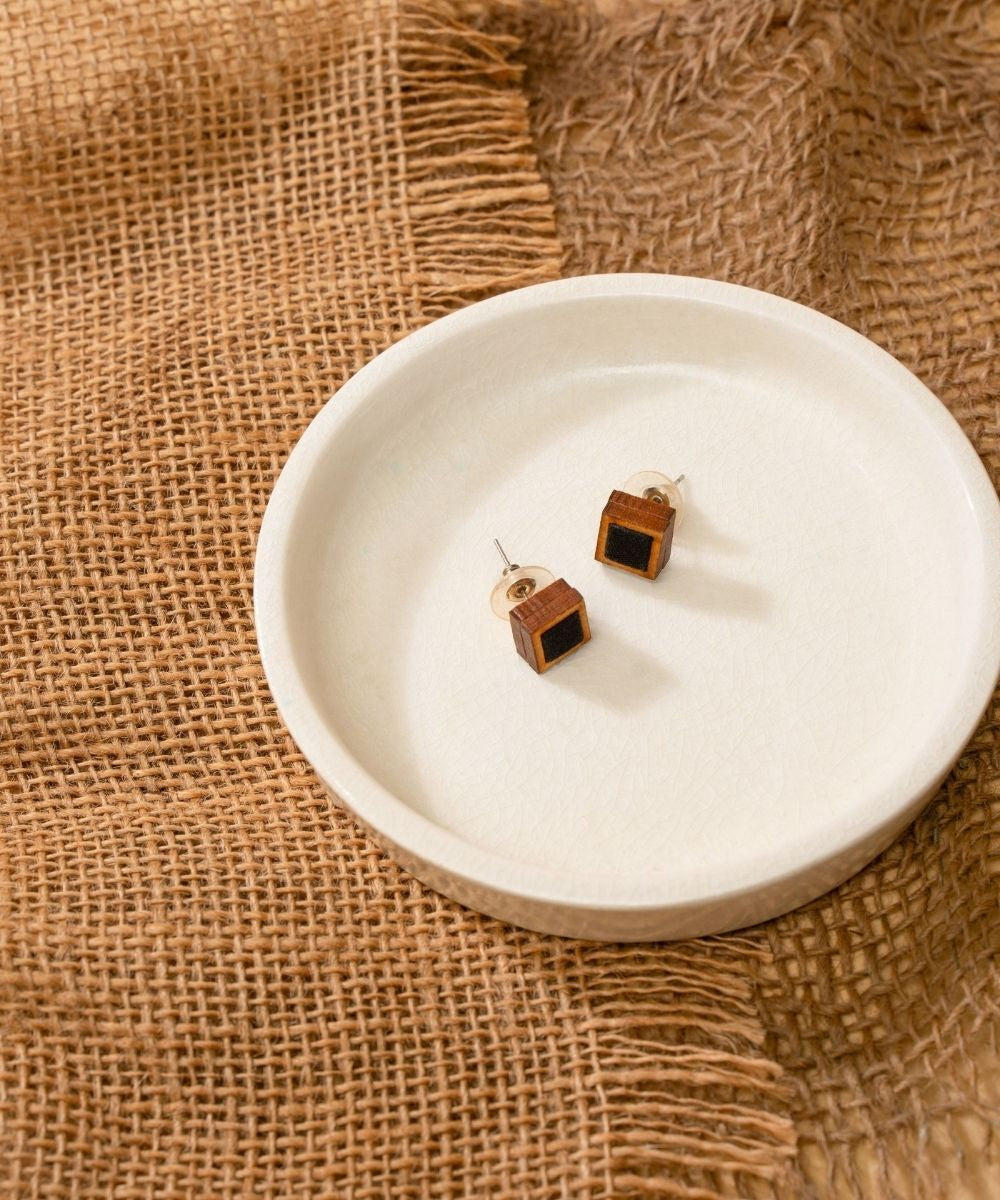 Black square repurposed fabric and wood studs