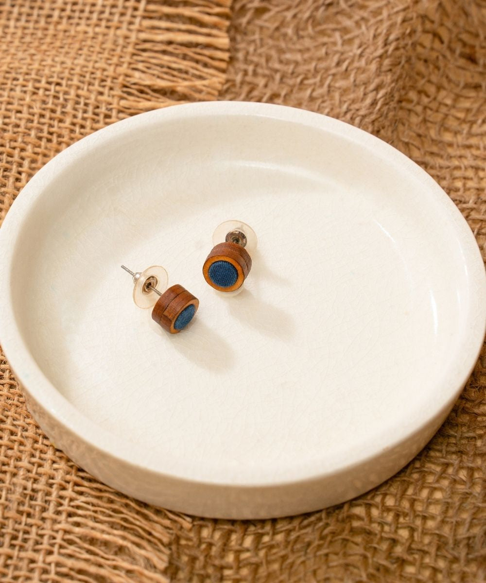 Blue round repurposed fabric and wood studs