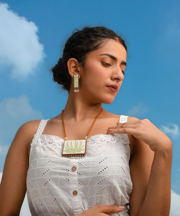 Green handmade repurposed fabric wood studs