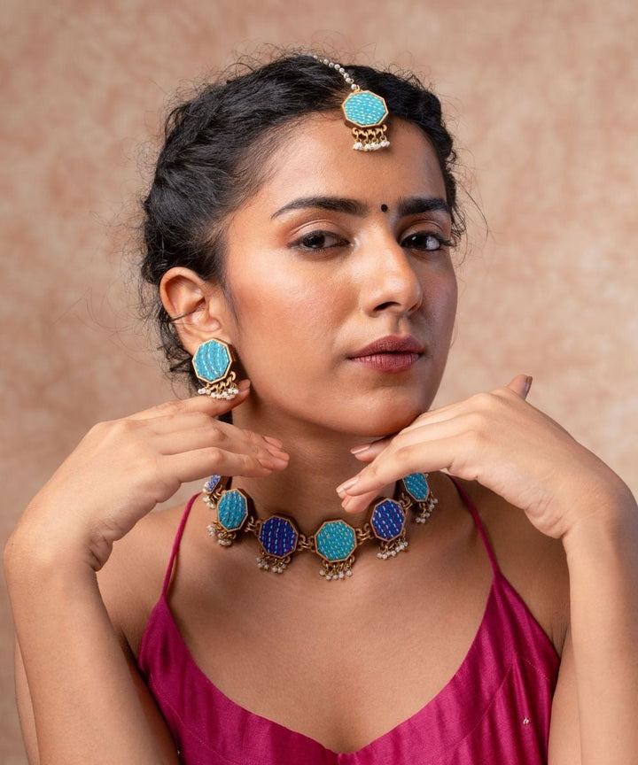 Turquoise kantha repurposed silk fabric and wood studs