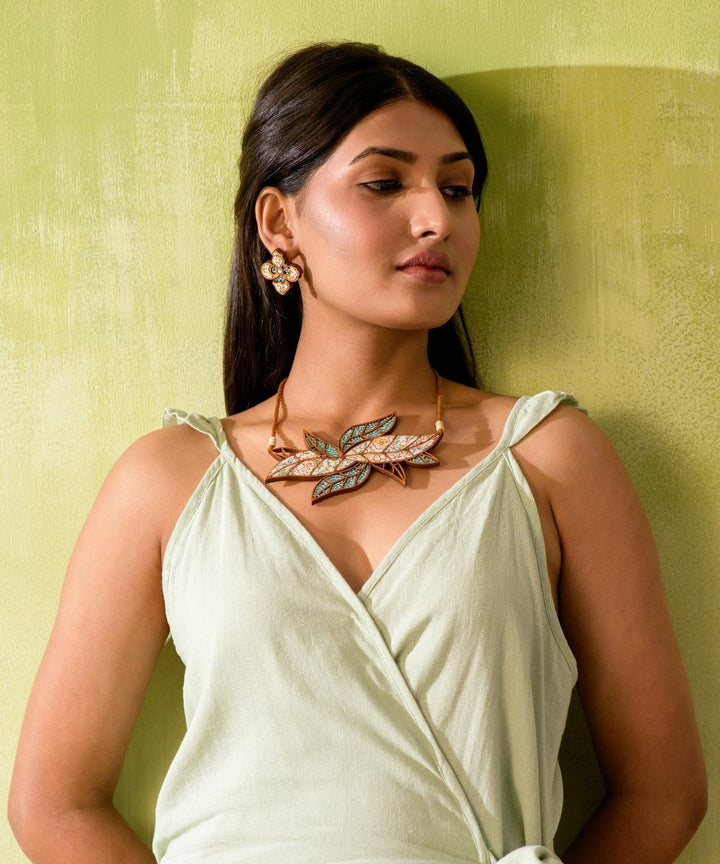 Turquoise white handmade bloom leaf motif repurposed wood necklace