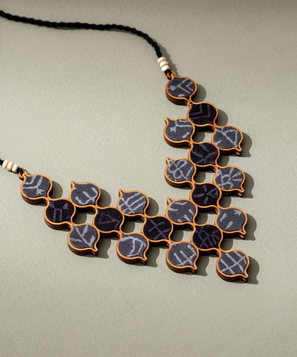 Grey tribal motives repurposed fabric wood statement necklace