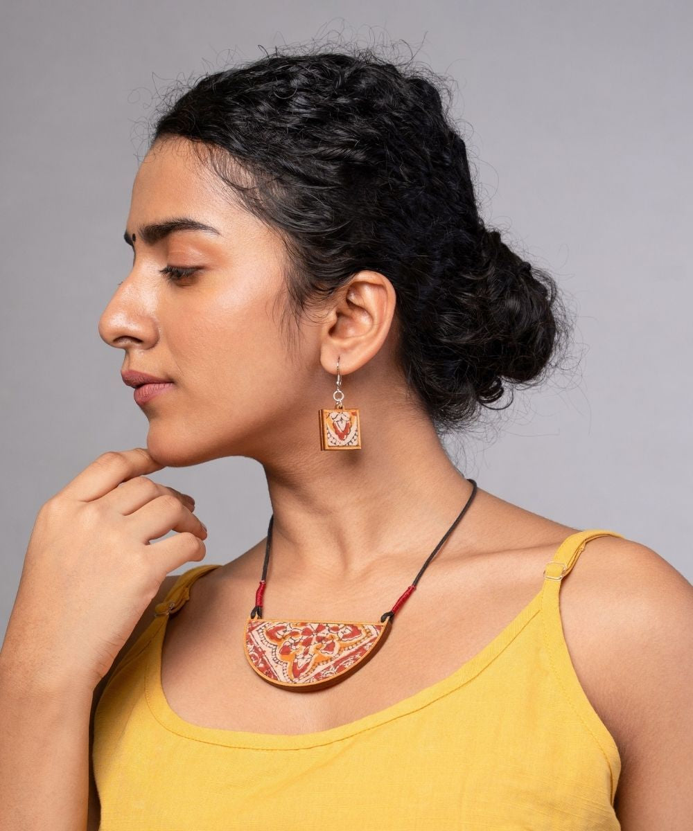 Red repurposed kalamkari fabric and repurposed wood pendant