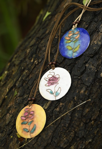 Blue tree pendant with hand woven cotton string