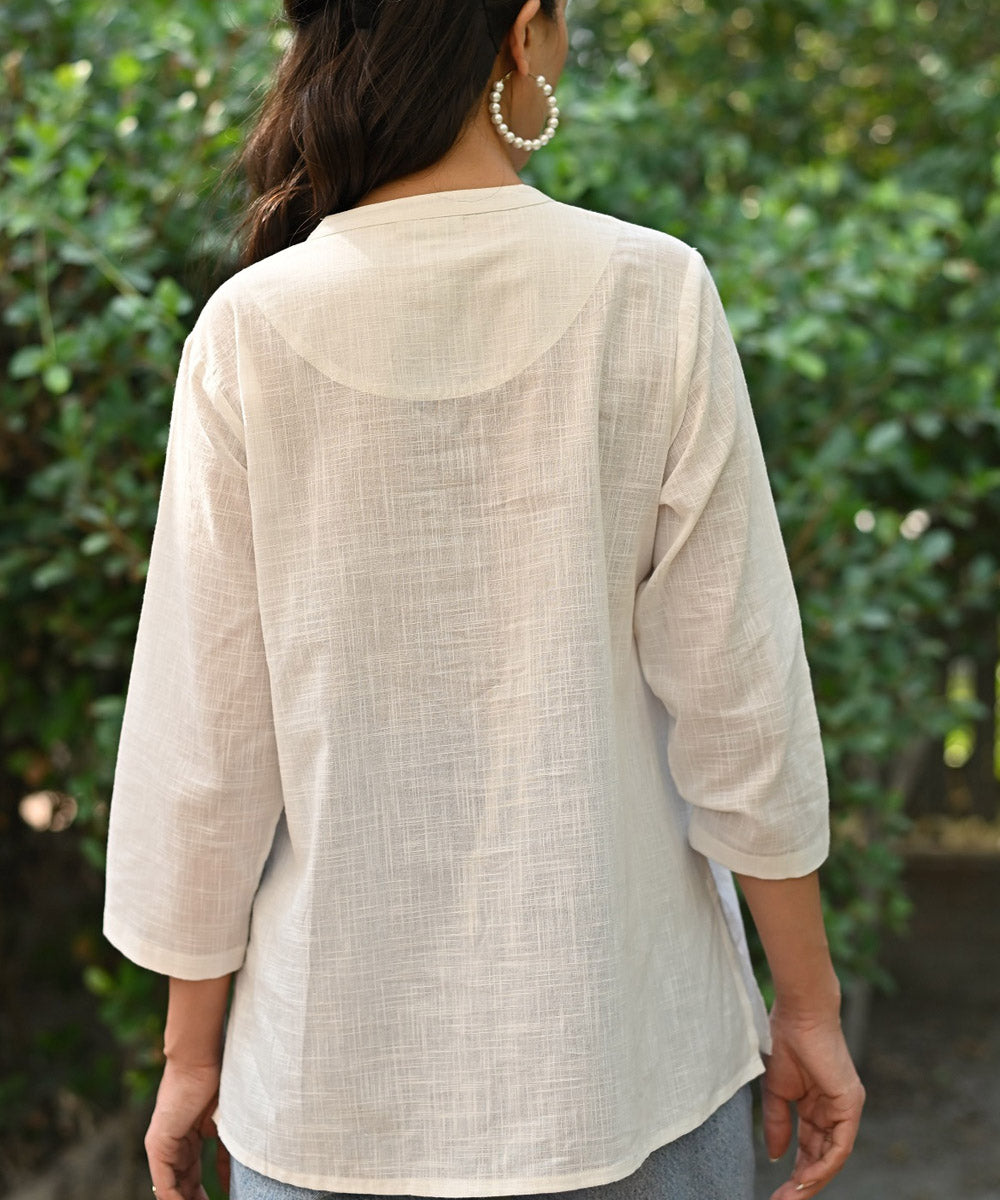White handembroidered cotton front open top