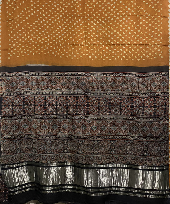 Mustard black hand printed bandhani modal silk saree
