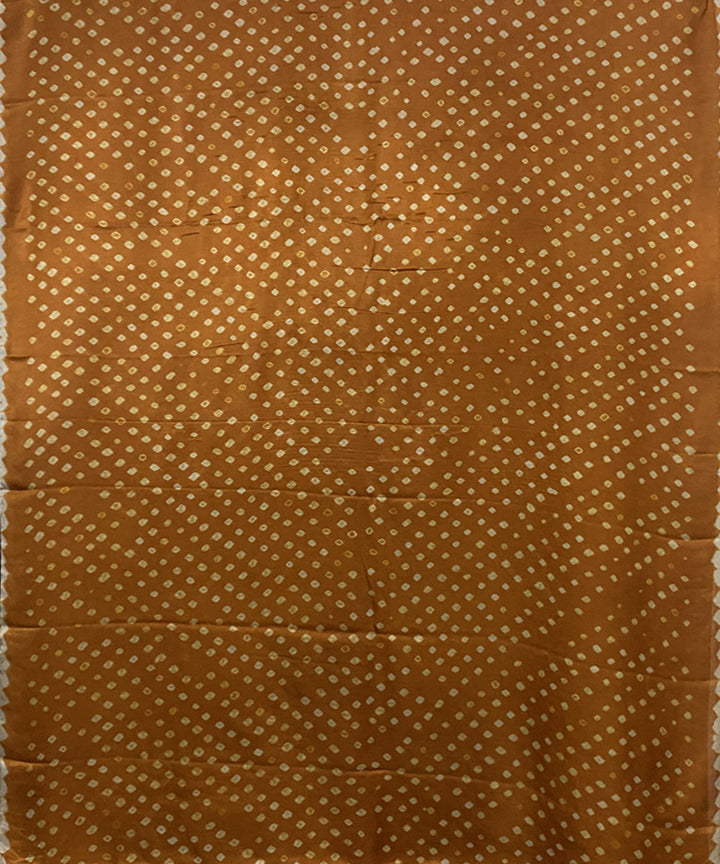 Mustard black hand printed bandhani modal silk saree