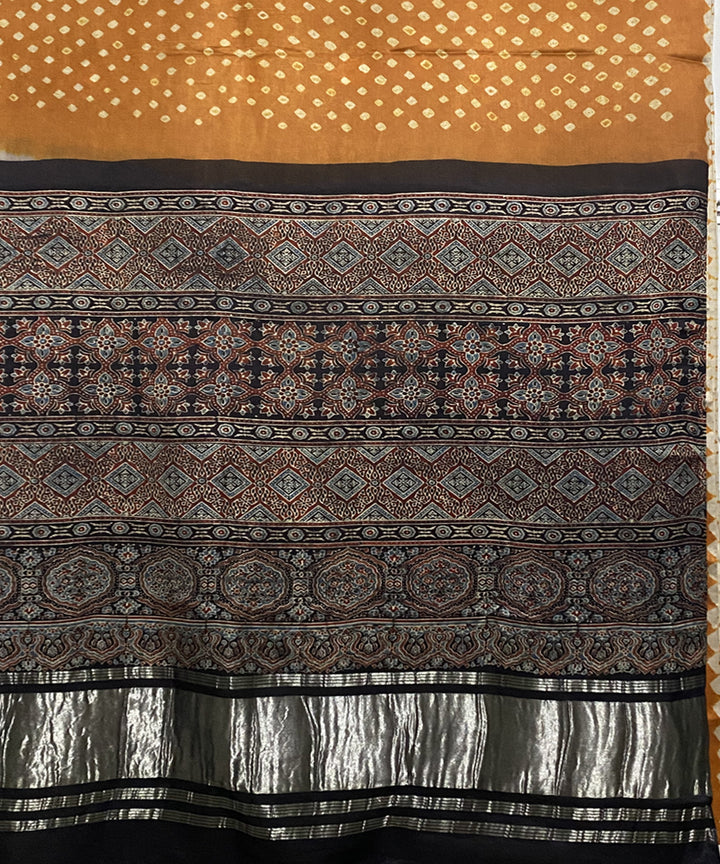 Mustard black hand printed bandhani modal silk saree