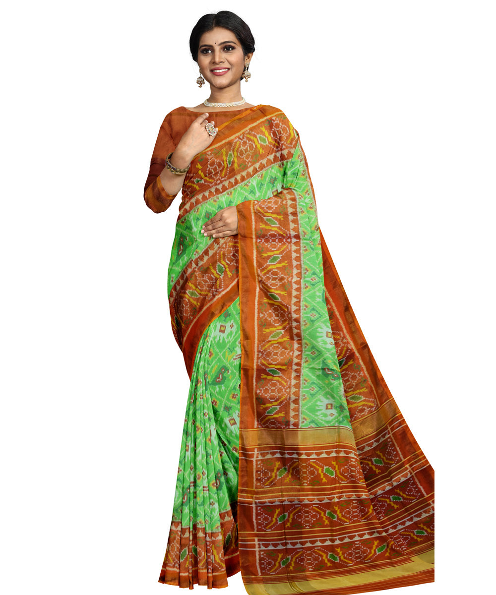 Orange parrot green silk handloom patola saree