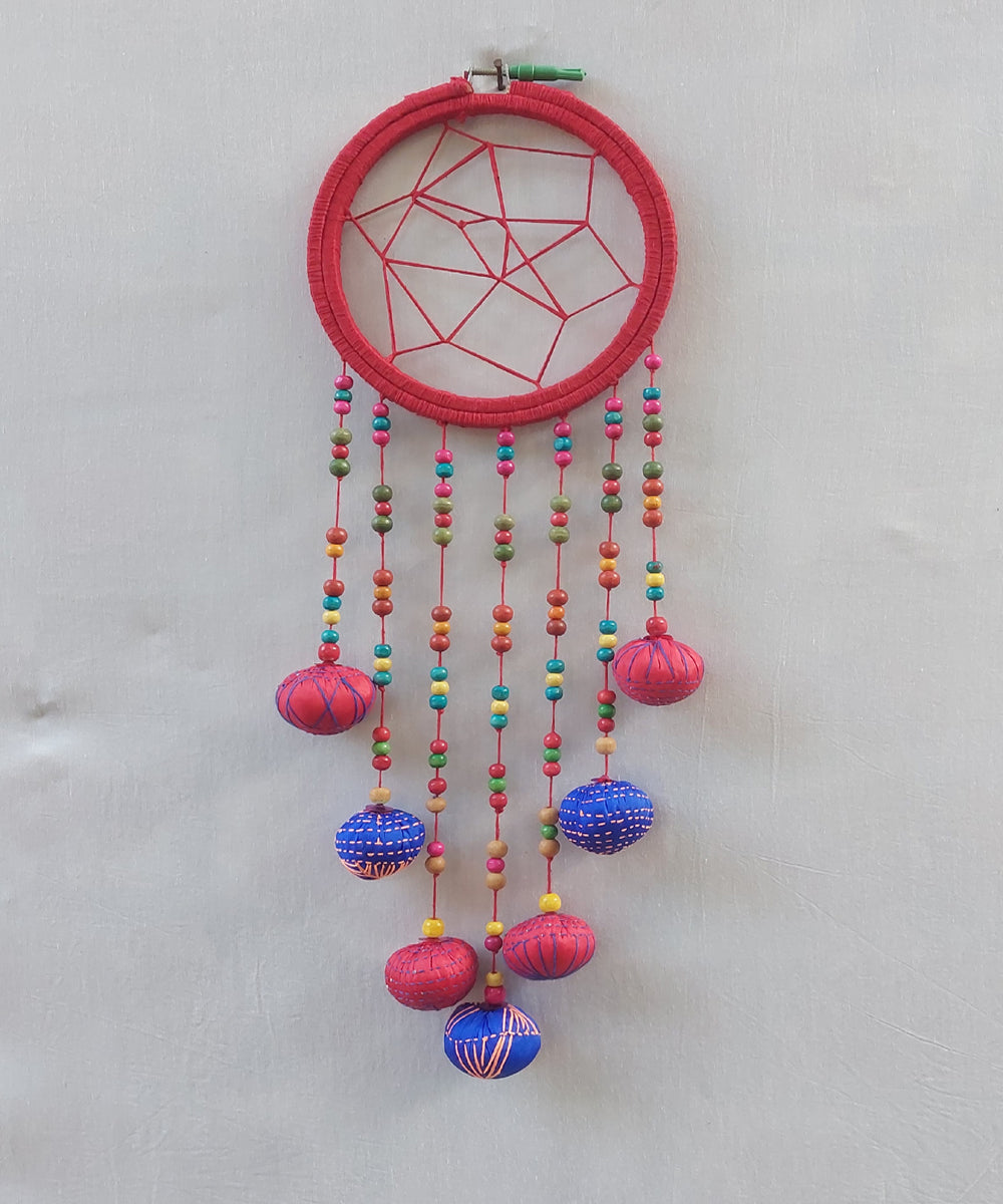 Red handcrafted wooden dream catcher