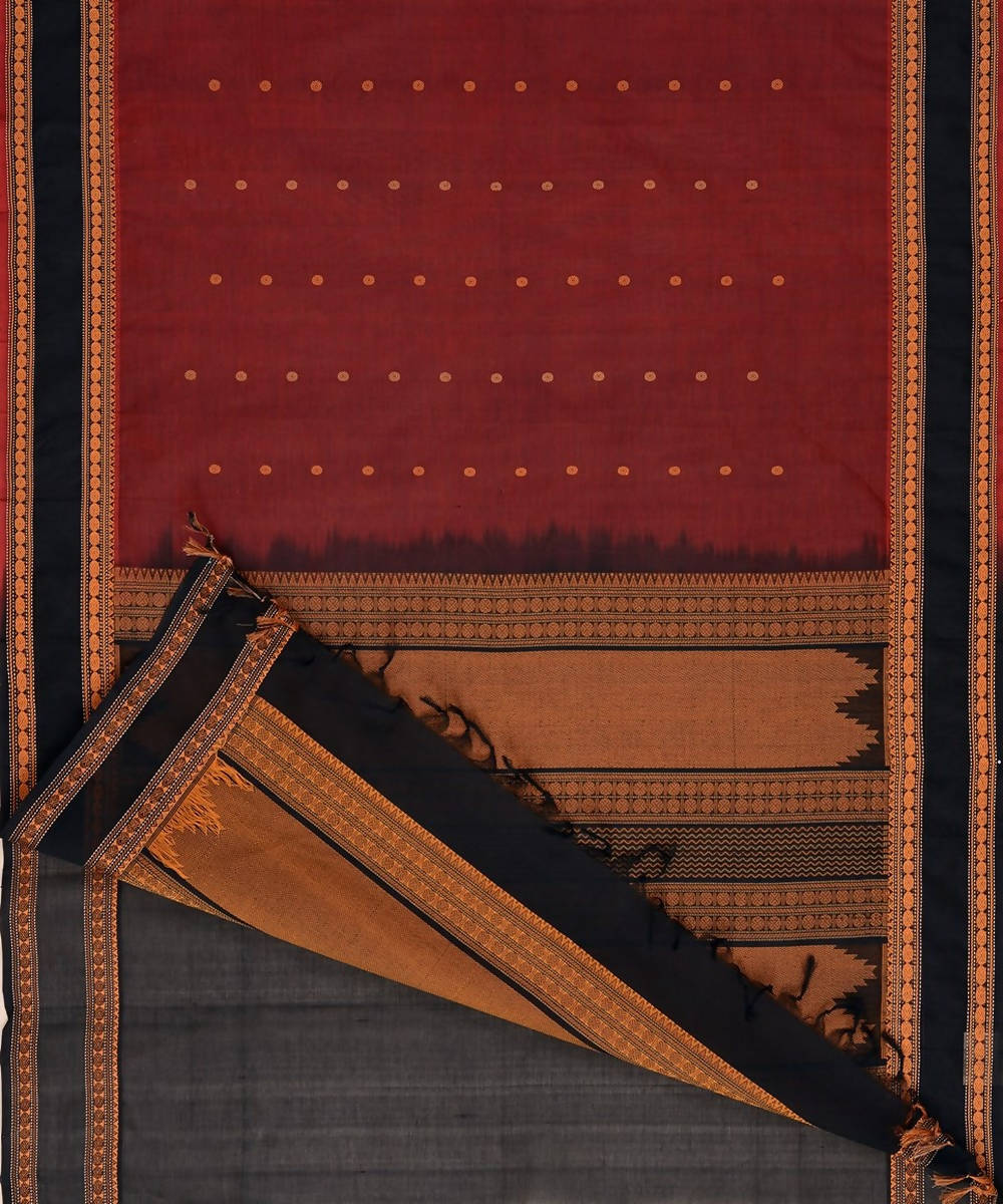 Dark red kanchi silkcotton saree with butta and contrast black border