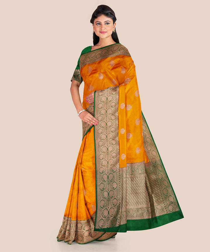 Mustard and bottle green silk handloom banarasi saree
