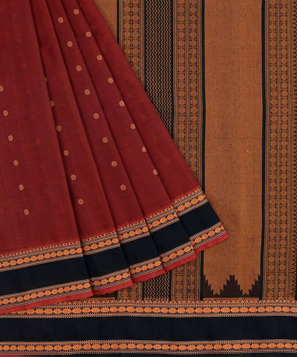 Dark red kanchi silkcotton saree with butta and contrast black border