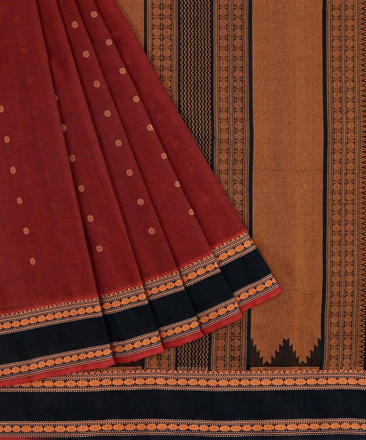Dark red kanchi silkcotton saree with butta and contrast black border