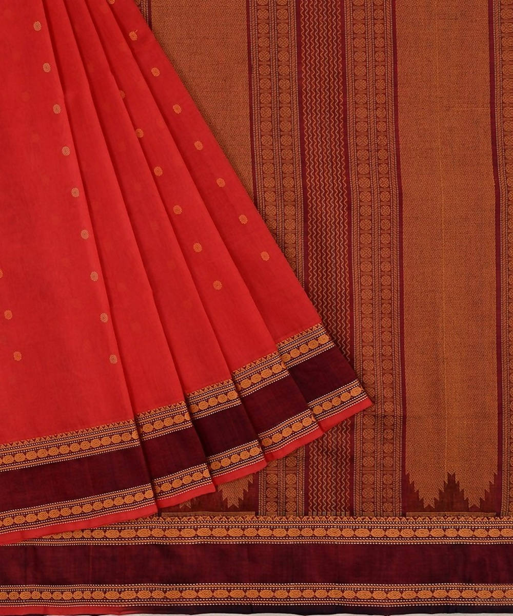 Scarlet red kanchi silkcotton saree with butta and maroon border